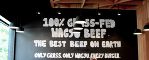 100% Grass-fed beef sign at Hiho Cheeseburger